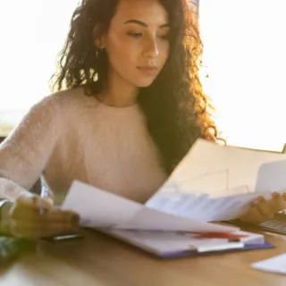 Woman looking at papers