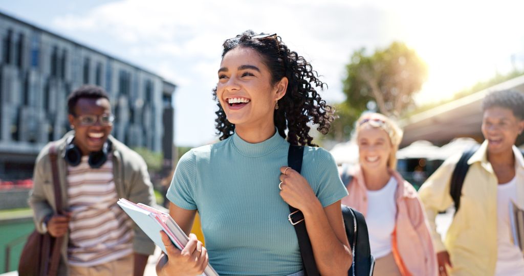 Girls walking with their friends at a university