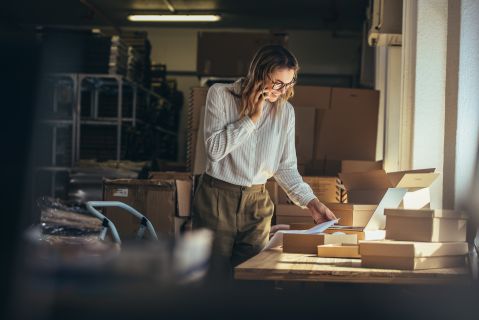 Woman online confirming orders on a phone