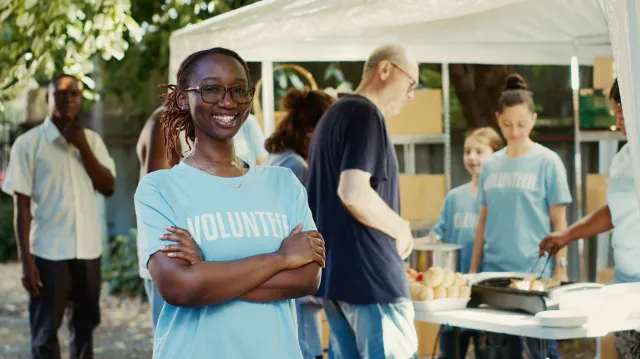 A newcomer volunteers to manage a local community event