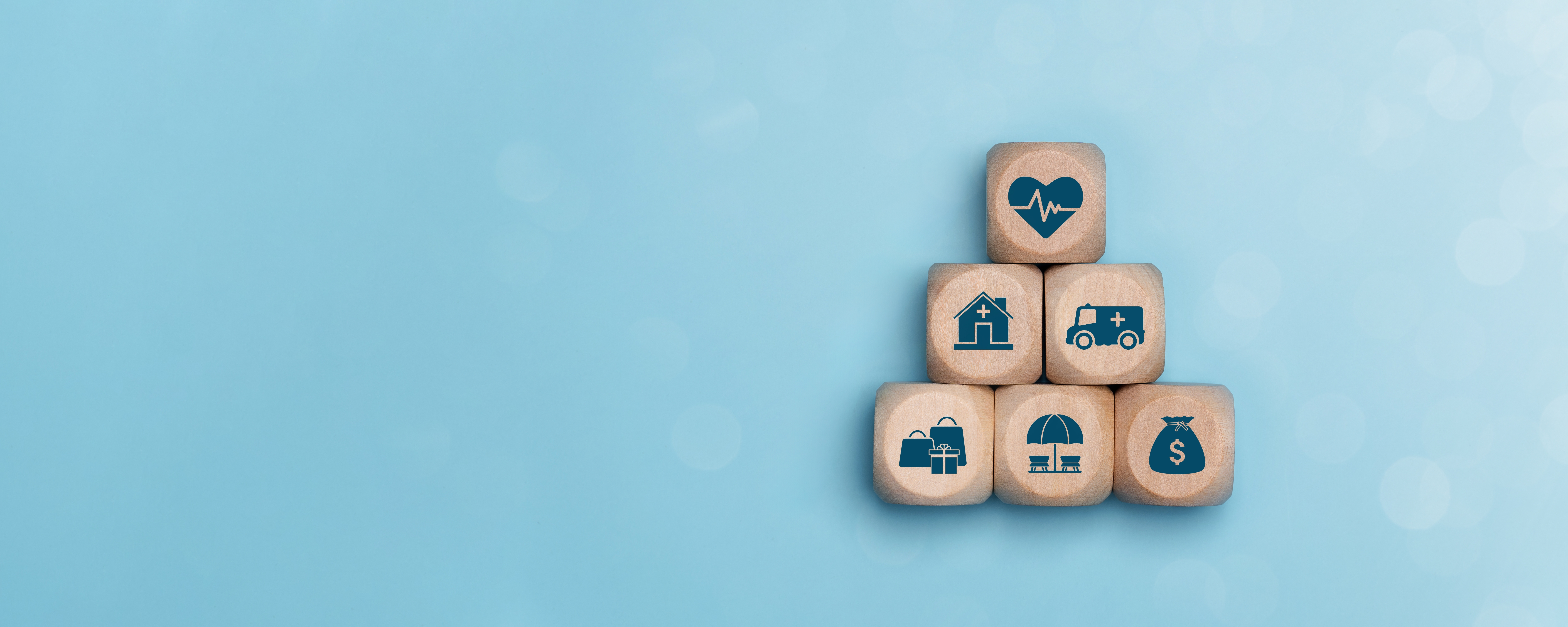 Icons on wooden blocks with a blue background